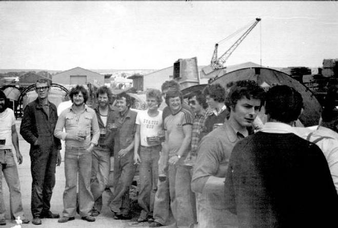 Macintosh HD:Users:rogerbateman:Desktop:RAMUS :Watercraft 5a Some of the workforce enjoying a beer by the far slipway, I think to toast the finish of one of the boats. Slightly before my time there..jpg
