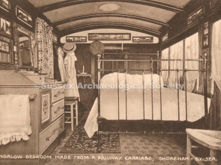 94.2567 Interior of the bedroom of a railway carriage bungalow, Bungalow Town, c.1928