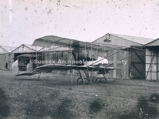 95. 2667. 4 Aerodrome Cecil and Eric Pashley sit in the cockpit of their Farman biplane