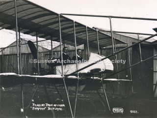 95. 2667. 6 Aerodrome Cecil and Eric Pashley sit in the cockpit of their Farman biplane